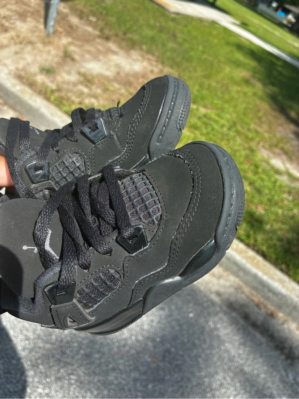 Kids Jordan 4 Black Cat Sneakers
